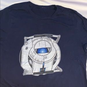 Blue shirt with Portal 2 character